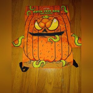 Spooky Pumpkin Backpack with Green Accents